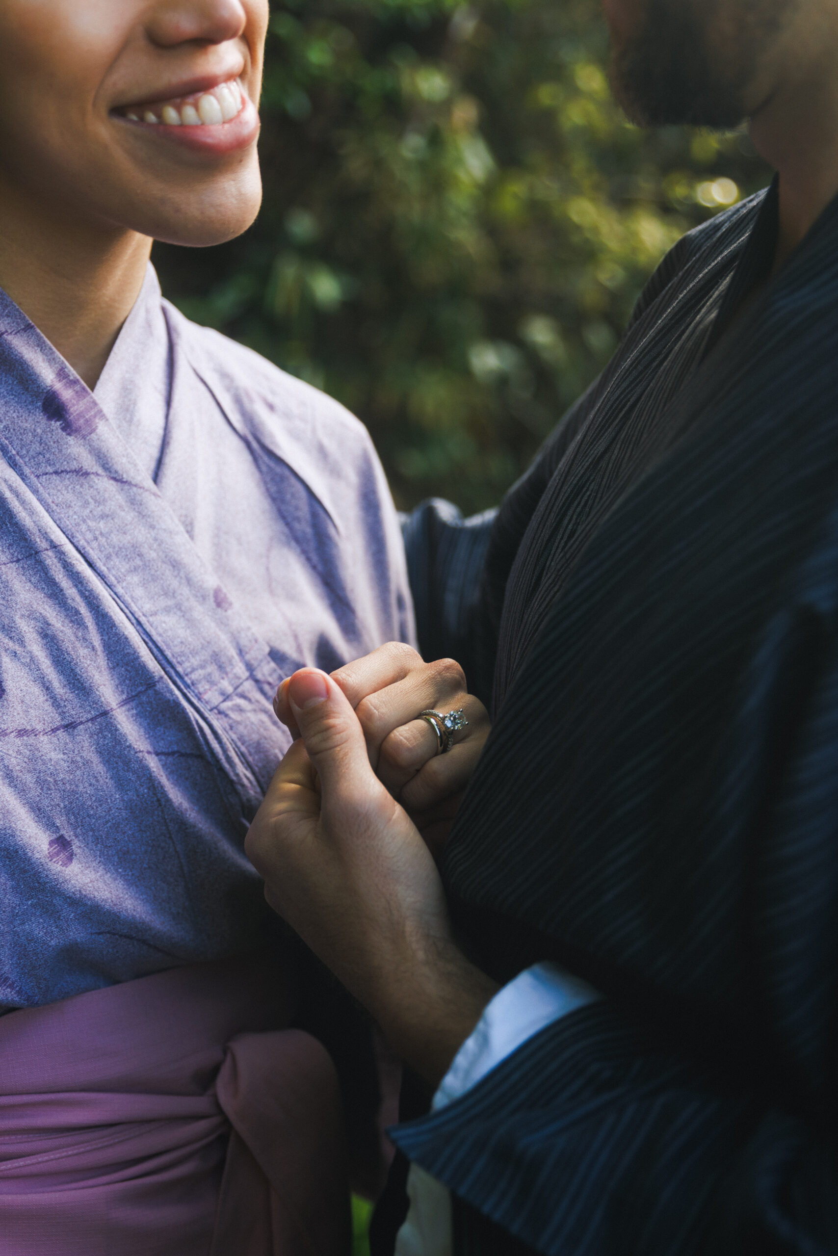 Surprise proposal photo shoot at Hakone Shrine’s Peace Torii gate with Lake Ashi and mountain views, capturing natural and candid moments.
