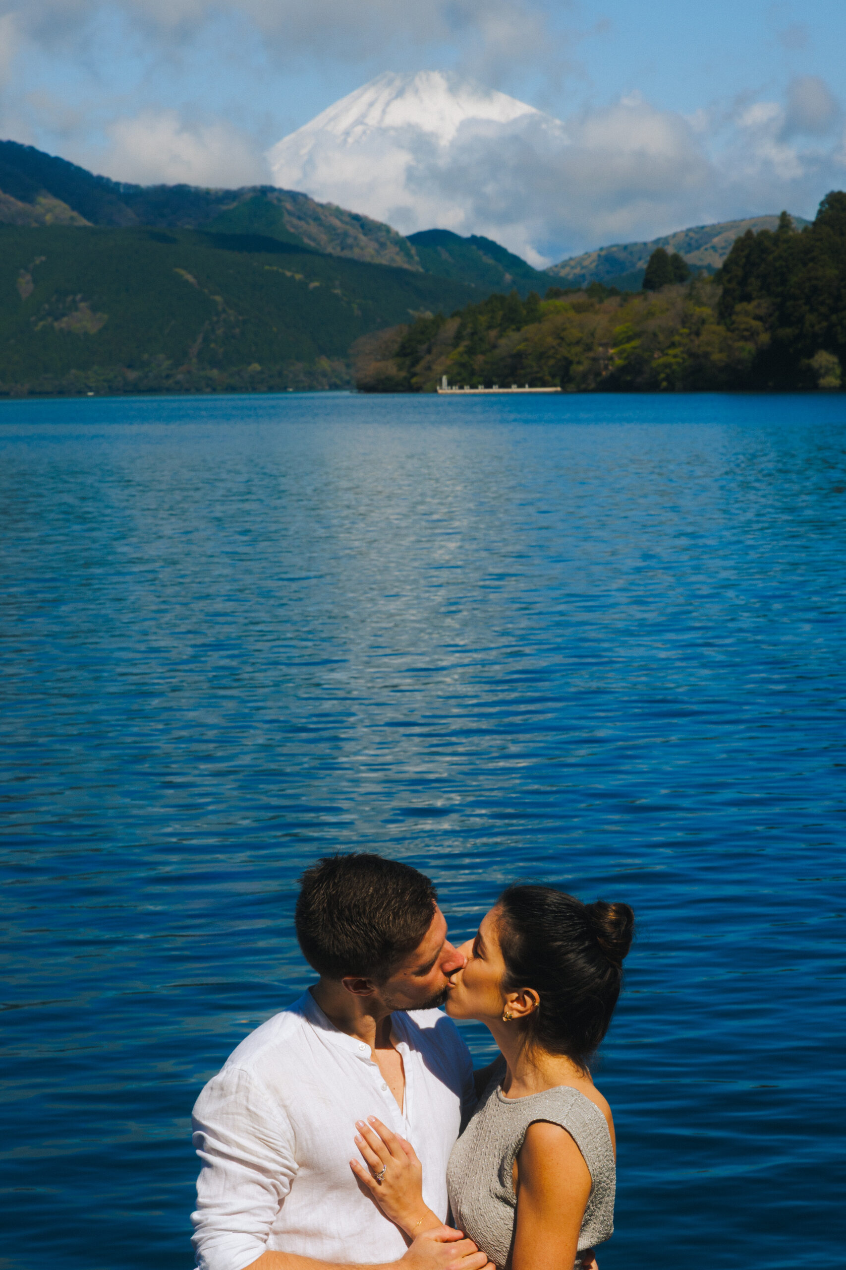 Authentic surprise proposal photography in Hakone with natural expressions, iconic locations, and timeless memories