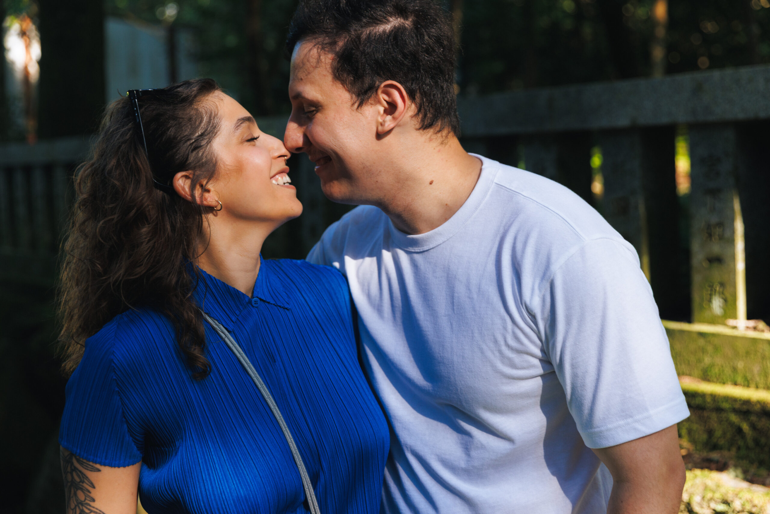 Hakone surprise proposal shoot featuring the iconic Torii gate, scenic lakefront, and intimate candid portraits of the couple.