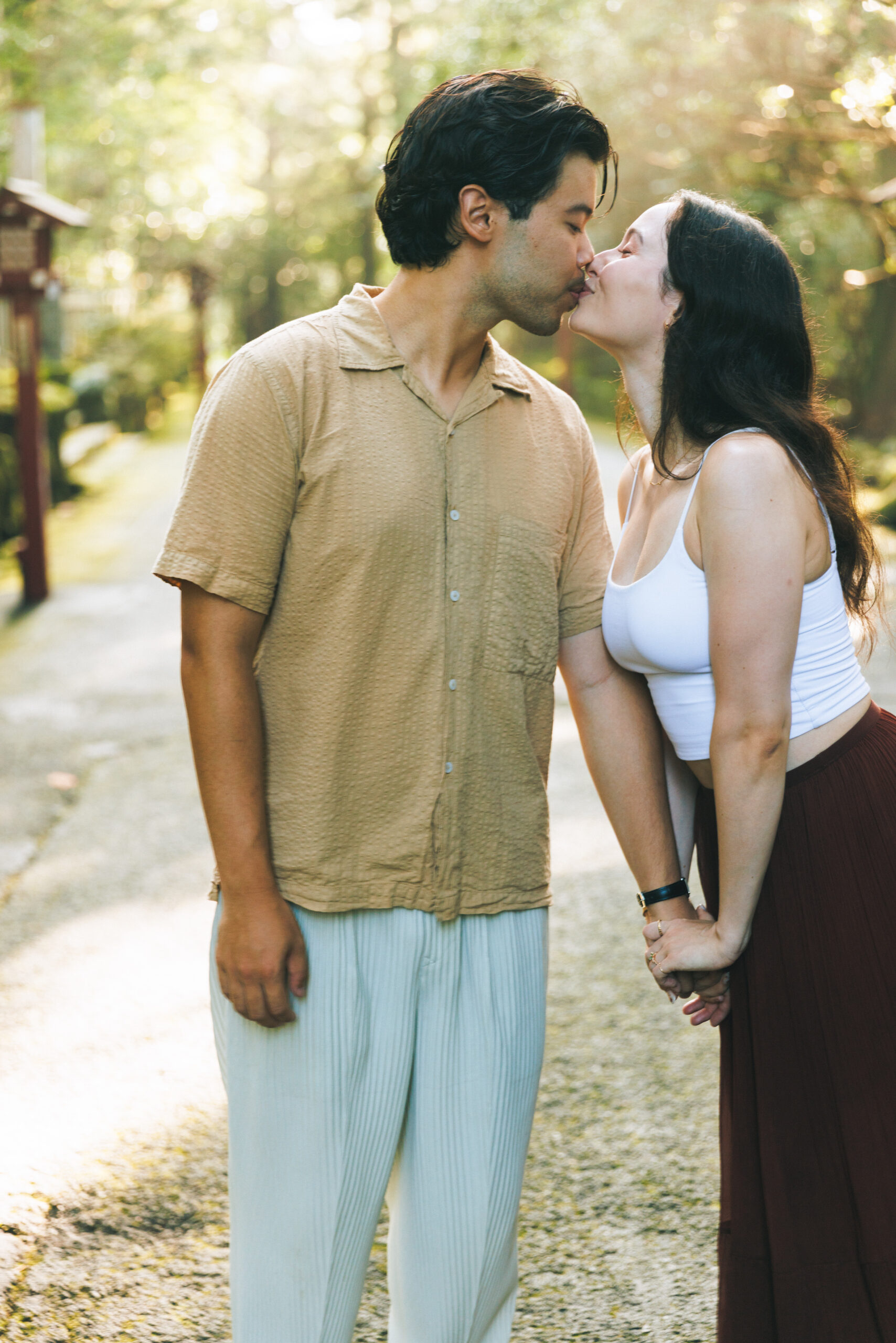 Surprise proposal in Hakone on a clear September morning, with blue skies and autumn light filtering through the trees, capturing emotional tears even without Mt. Fuji.