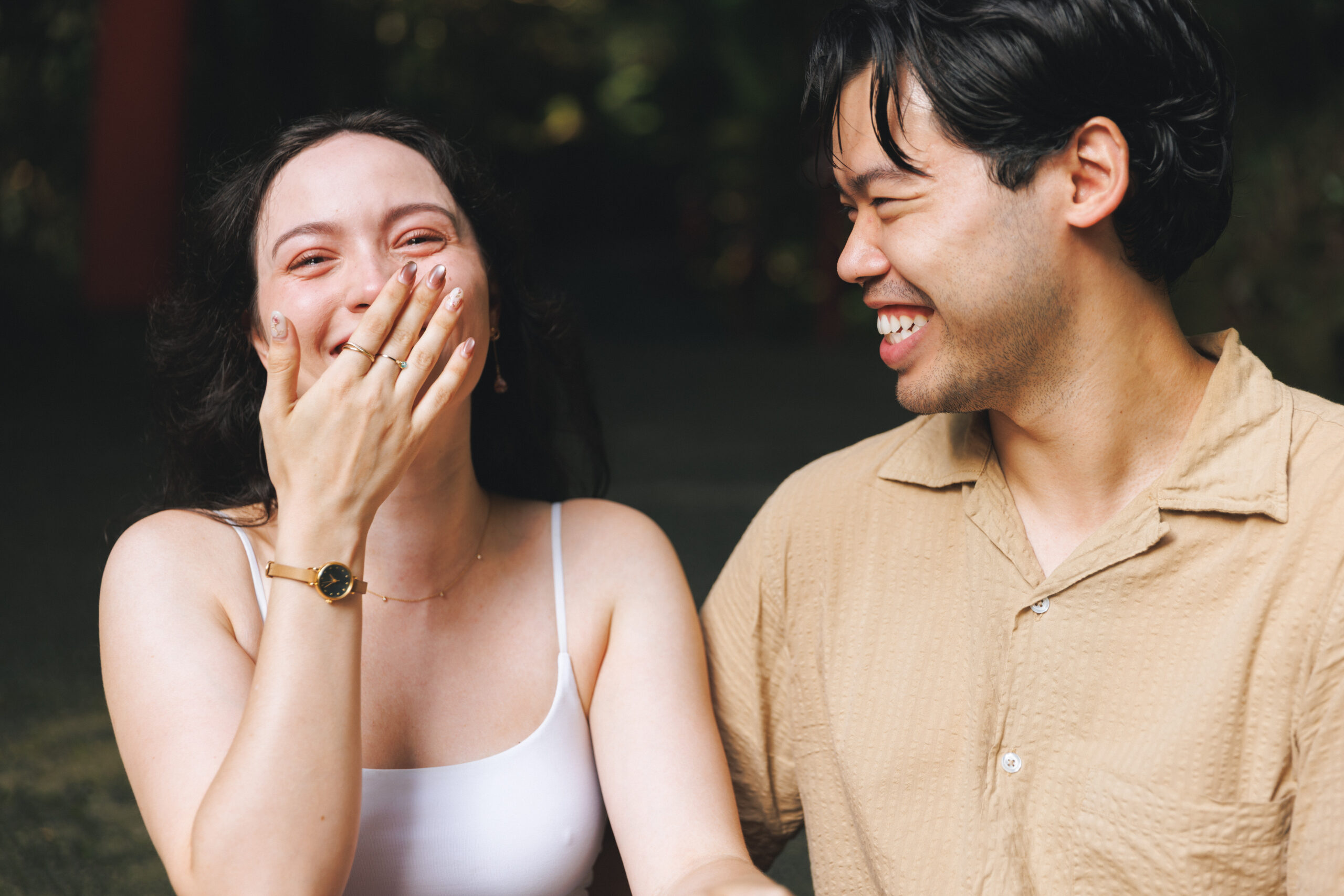 Surprise proposal in Hakone on a clear September morning, with blue skies and autumn light filtering through the trees, capturing emotional tears even without Mt. Fuji.